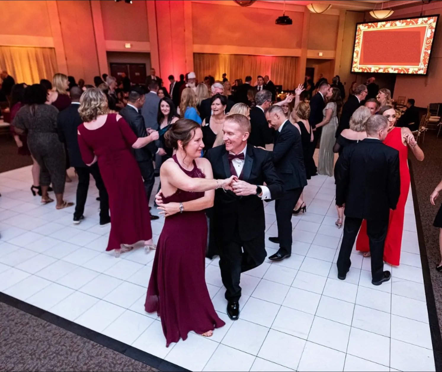 Guests dancing at a gala in the Glazer JCC Event Venue ballroom